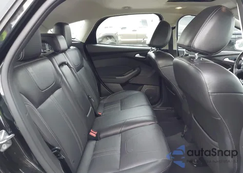 2014 Ford Focus Titanium z USA, uszkodzony, nr VIN 1FADP3N26EL294721